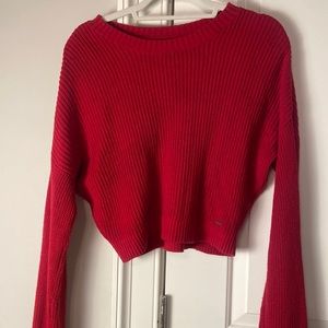 Small Holister red sweater never worn before